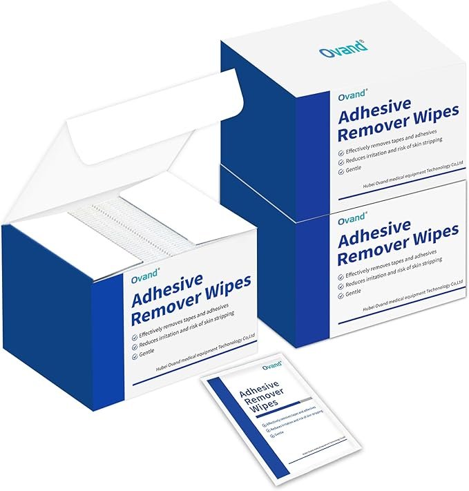 Adhesive remover wipes